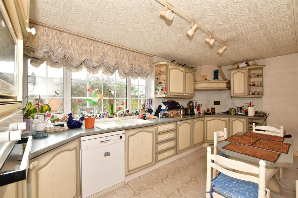 Kitchen with access to Utility area